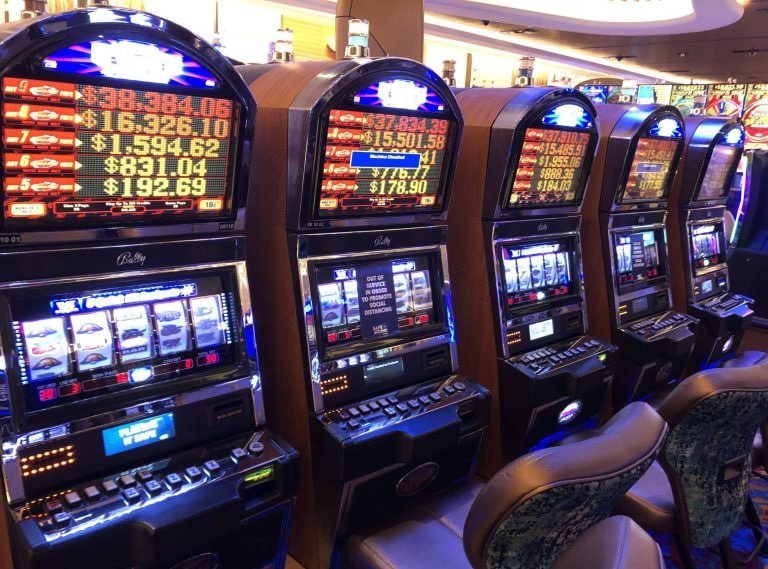Multi-bet ticket selection interface on data taiwan mobile app showing combined football, live dealer, and slot options